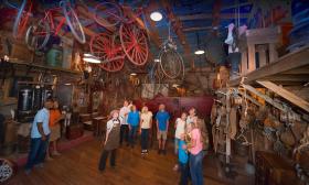 A tour guide and a group of guests enjoy Old Town Trolley's Oldest Store in St. Augustine, Florida
