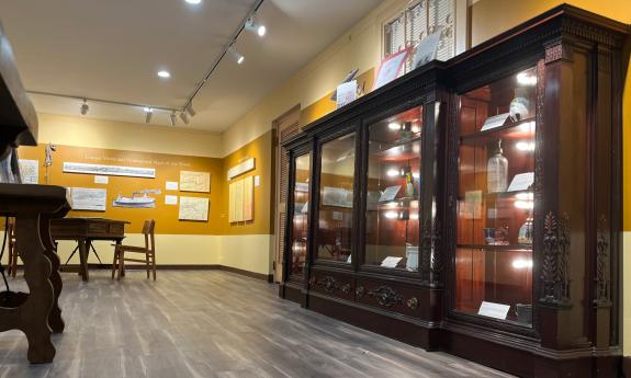 An artifact cabinet in the historic Oldest House Museum in St Augustine FL