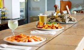 Three seafood plate and drink combinations from Seafood Kitchen