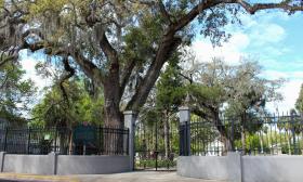 The ornate iron gates of the Tolomato Cemetery in St Augustine FL
