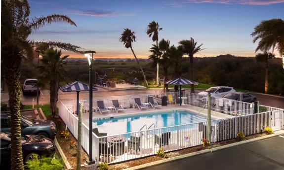 The Ocean Sands heated pool as seen at sunset over the Tolomato River