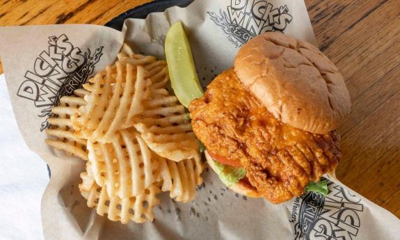 Chicken sandwich and salted waffle fries from Dick's Wing and Grill