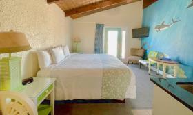 King suite with limited ocean view and spa tub at Magic Beach Motel — Vilano Beach