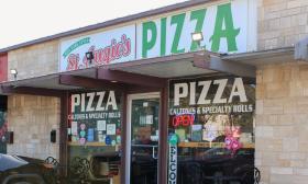 The entrance to St. Augie's Pizza is located on King Street just east of Riberia