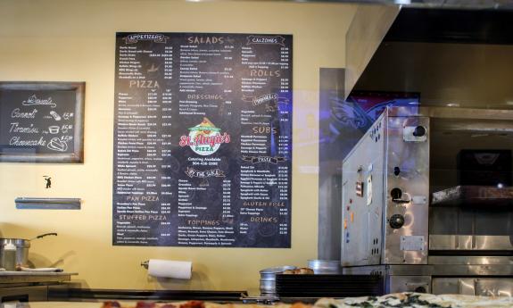 The menu at St. Augie's Pizza, serving New York style pizzas, pinwheels, salads, and more