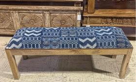 This bench, with a blue-patterned kilim seat, is for sale at Artisan Furniture and Finds on Ponce de Leon