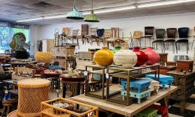 Chairs, urns, small and large tables, and artisan items on display at Artisan Furniture and Finds