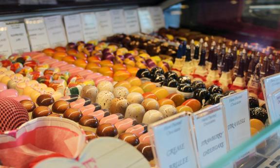 One of the display cases showcasing the pastries and sweets available at Le Macaron on Cathedral Place in downtown St. Augustine, FL