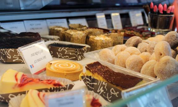 One of the display cases showcasing the pastries and sweets available at Le Macaron on Cathedral Place in downtown St. Augustine, FL