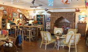 Handcrafted Indonesian furniture, decor, art, and accessories are featured at Coastal Traders