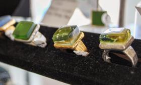 Some of the eclectic jewelry made from a variety of mediums are displayed at Metalartz Gallery