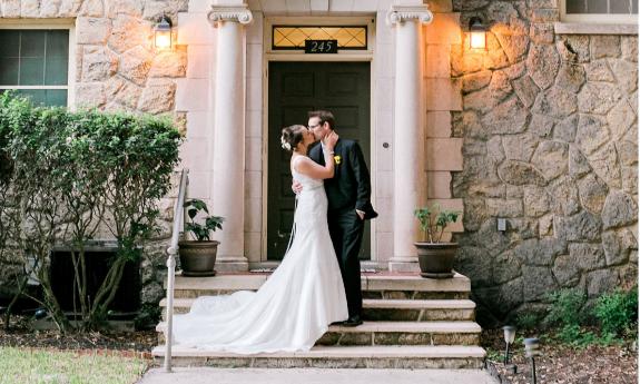 newlyweds at Marywood Retreat Center doorway