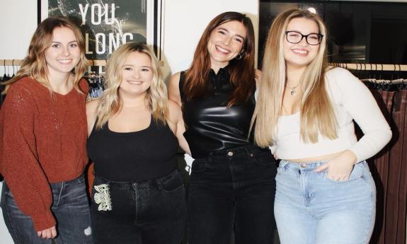 vibe team of four women smiling