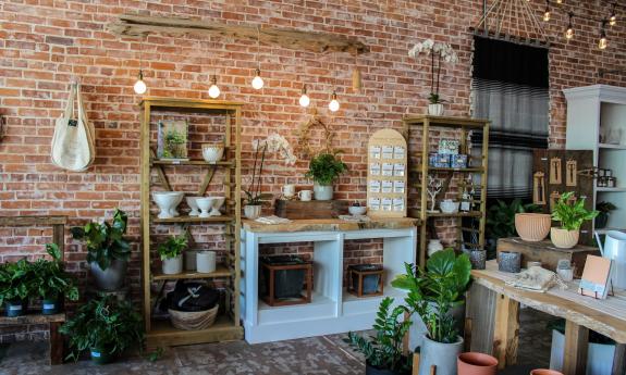 Feather + Bloom offers a range of merchandise, from home decor items to handmade jewelry