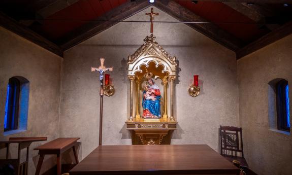 The altar and a statue of Mary with the baby Jesus at the shrine at Nombre de Dios