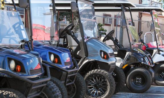 Solano Cycle in Uptown San Marco rents all sorts of vehicles, including remodeled golf carts like these