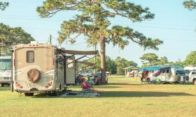 The campground at the Gamble Rogers Music Festival in 2023, with RVs and trailers