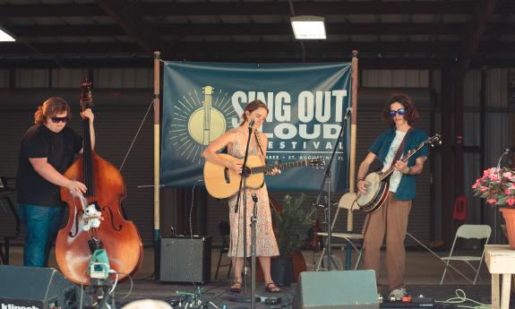 A young trio on the youth stage at the Gamble Rogers Music Festival in 2023