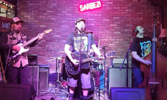 The four members of Mudtown performing at Sarbez