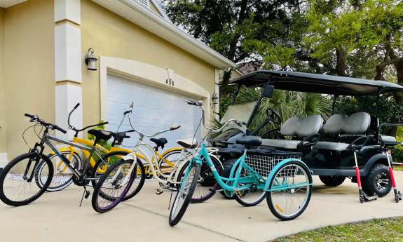 Vilano Luxury Properties has bikes, scooters, and a golf cart for guests to use