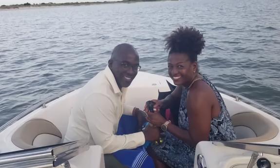 A couple enjoying a ride on a private boat tour