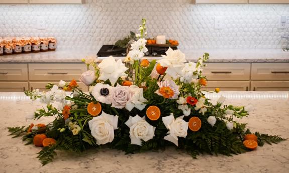 Citrus and flower arrangement centerpiece