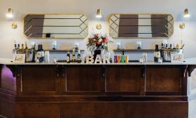 Decorated bar set up for an event at Parlor Room Events
