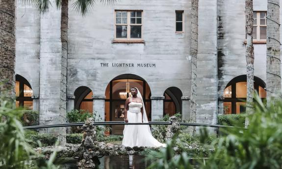 Bride posing in front in the Lightner Museum garden