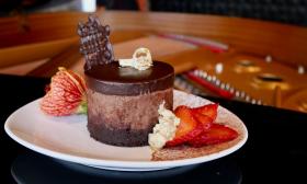 One of the signature desserts from Chez L'Amour is the Ponce, a datil and dark chocolate cheesecake