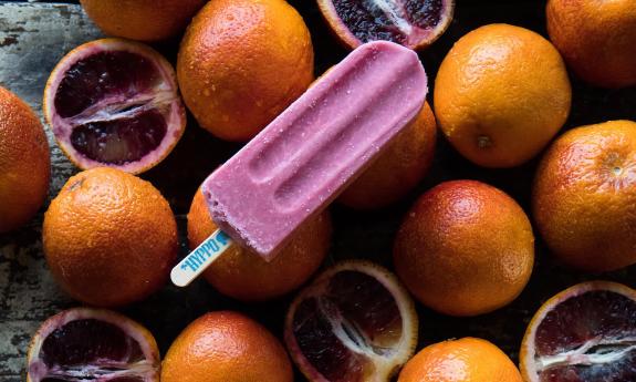 A blood orange cheesecake popsicle