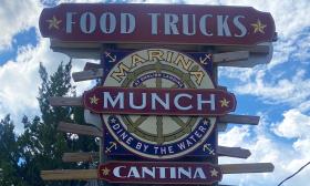 The Marina Munch sign advertising food trucks