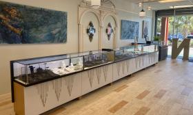 Display cases presenting pieces available for purchase