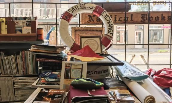 Different types of books, maps, and specialized items displayed