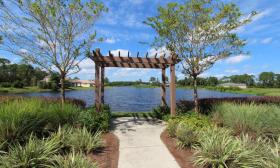 Wooden pergola situated at one of Madeira at St. Augustine's lakes