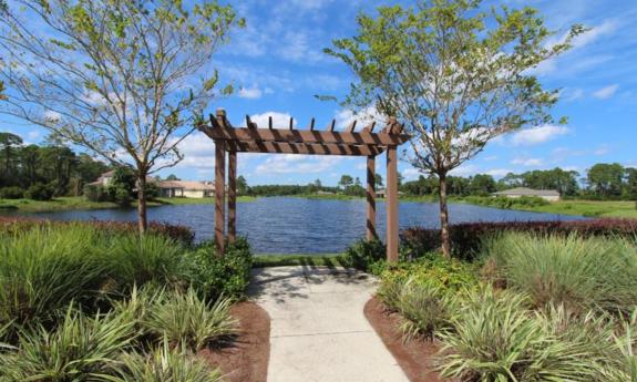 Wooden pergola situated at one of Madeira at St. Augustine's lakes