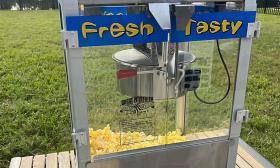 A popcorn machine used to accommodate small or big parties