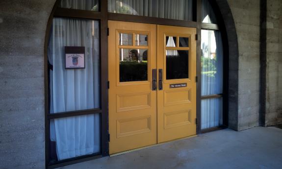 The yellow doors to the Alcazar Room are entered from the courtyard