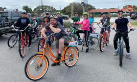 A family group with kids on rental bikes from Island Life Bikes on Anastasia Island