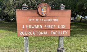 The J. Edward "Red" Cox park entrance sign