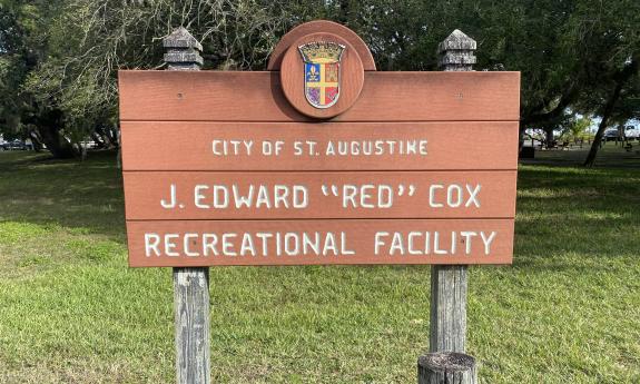 The J. Edward "Red" Cox park entrance sign