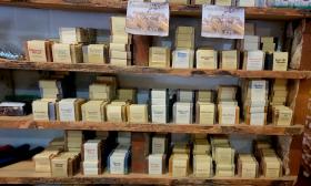 Shelves filled with an array of homemade soaps