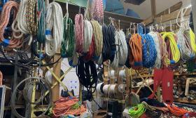 An assortment of ropes hanging up in one of the shop's hallways