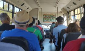 Passengers facing the driver and host on the Accord Freedom Trail Trolley Tour