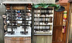 Displays of handcrafted jewelry items outside the shop