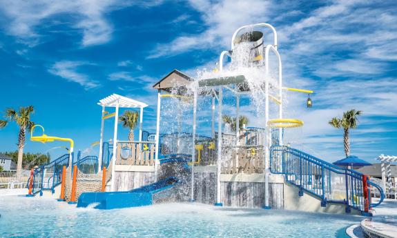 A splash park is on-site for kids to have a fun-filled summer day