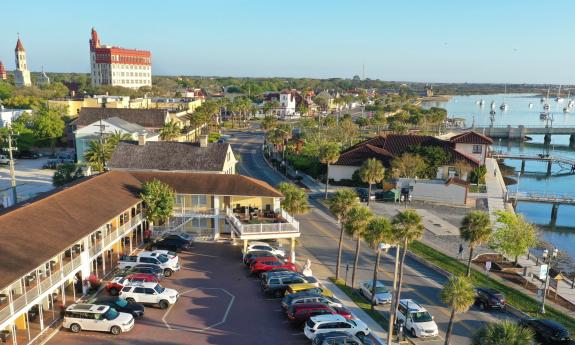 Marion Motor Lodge from an aerial view, showing buildings downtown and the Bridge of Lions