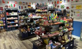 The inside of the shop with candy organized by country
