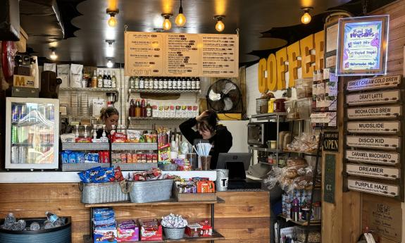 The menu is positioned behind the counter for view