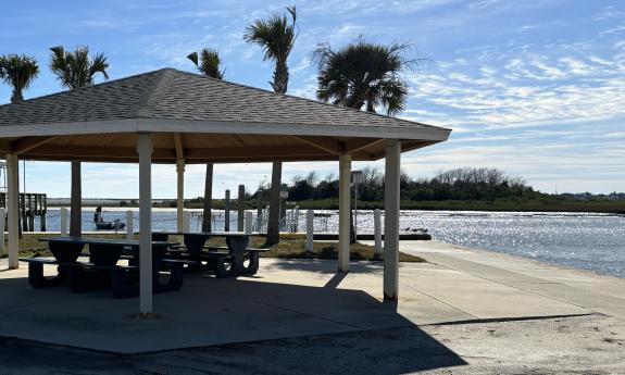 A shaded picnic area overlooking the water