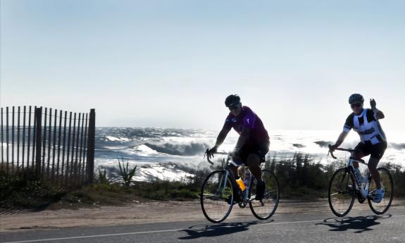 Cyclists riding along historic A1A with views of the Atlantic